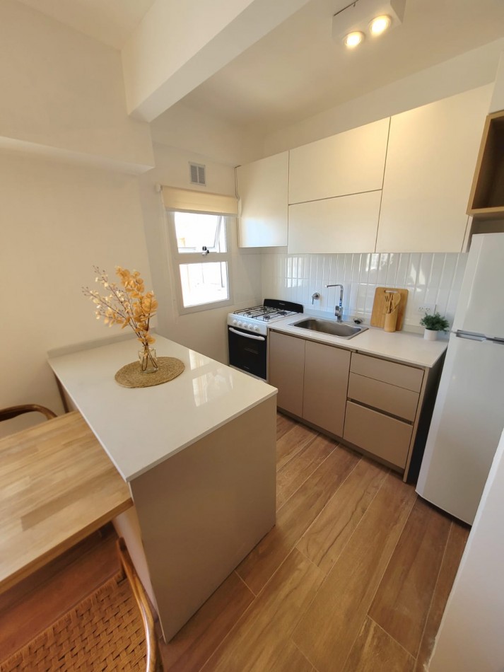 Departamento dos ambientes con espacio de cochera