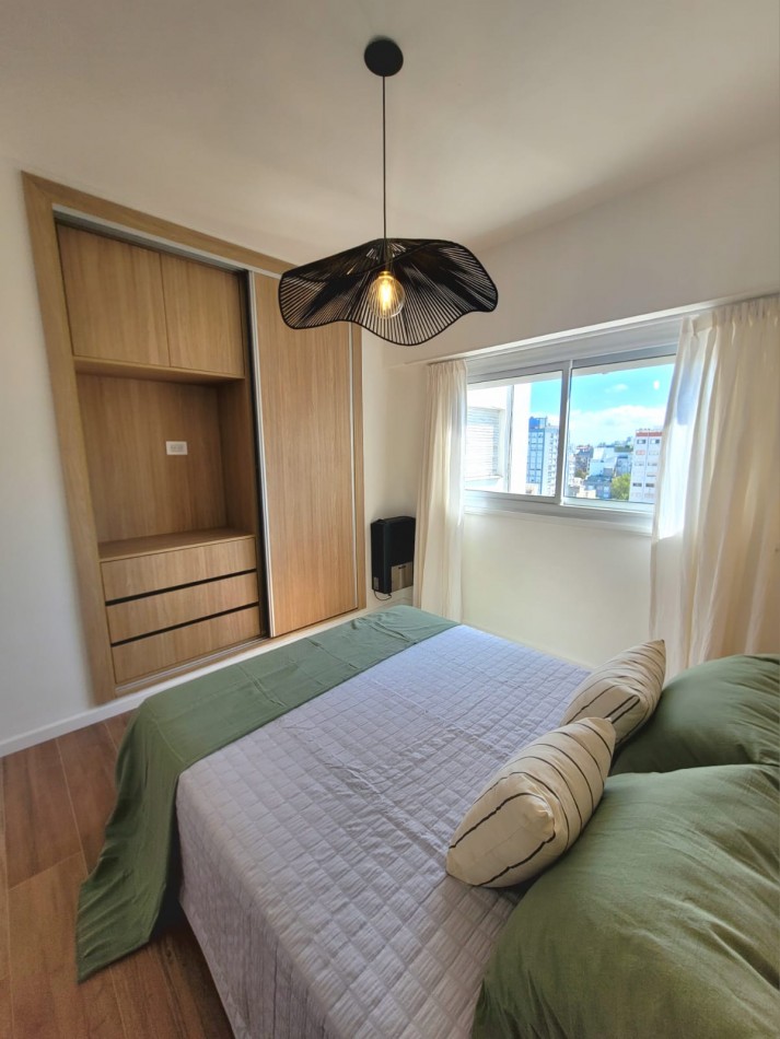 Departamento dos ambientes con espacio de cochera