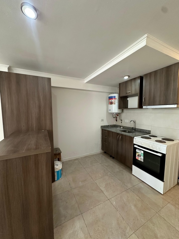 Monoambiente en edificio moderno con cochera