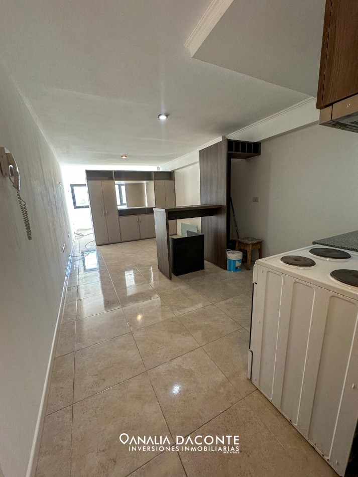 Monoambiente en edificio moderno con cochera